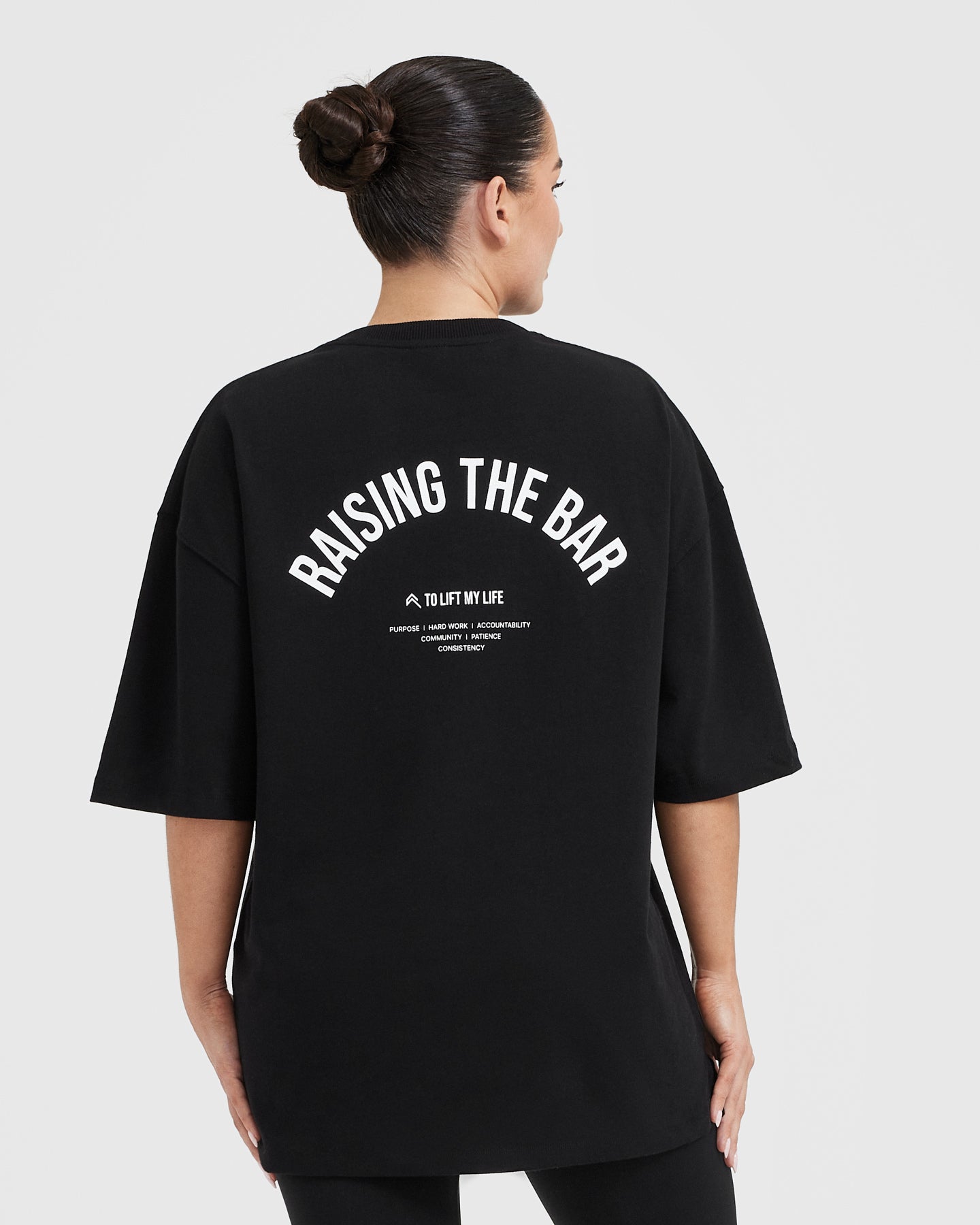 Alternative view of Raising The Bar Graphic Unisex T-Shirt | Black