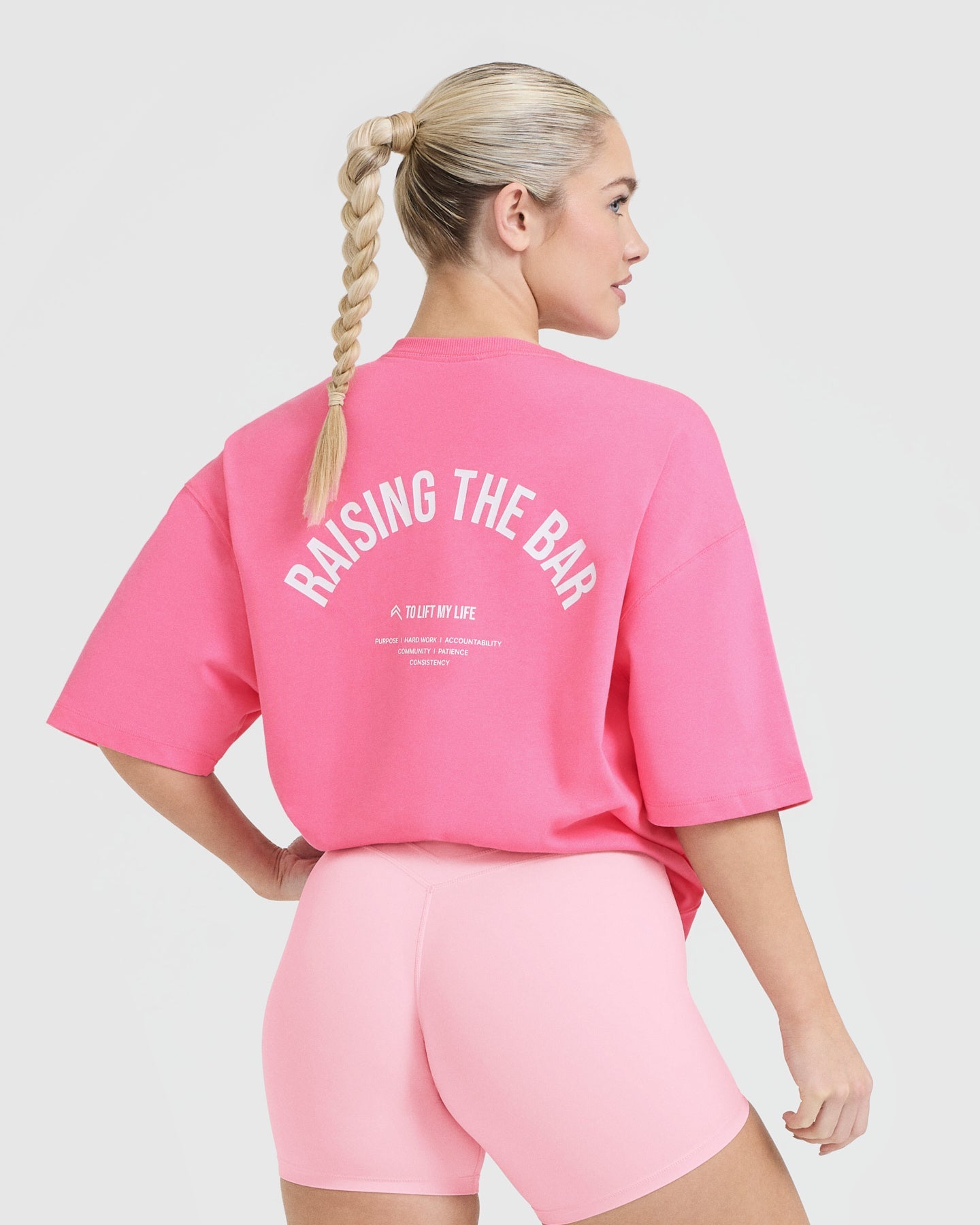 Alternative view of Raising The Bar Graphic Unisex T-Shirt | Peony Pink