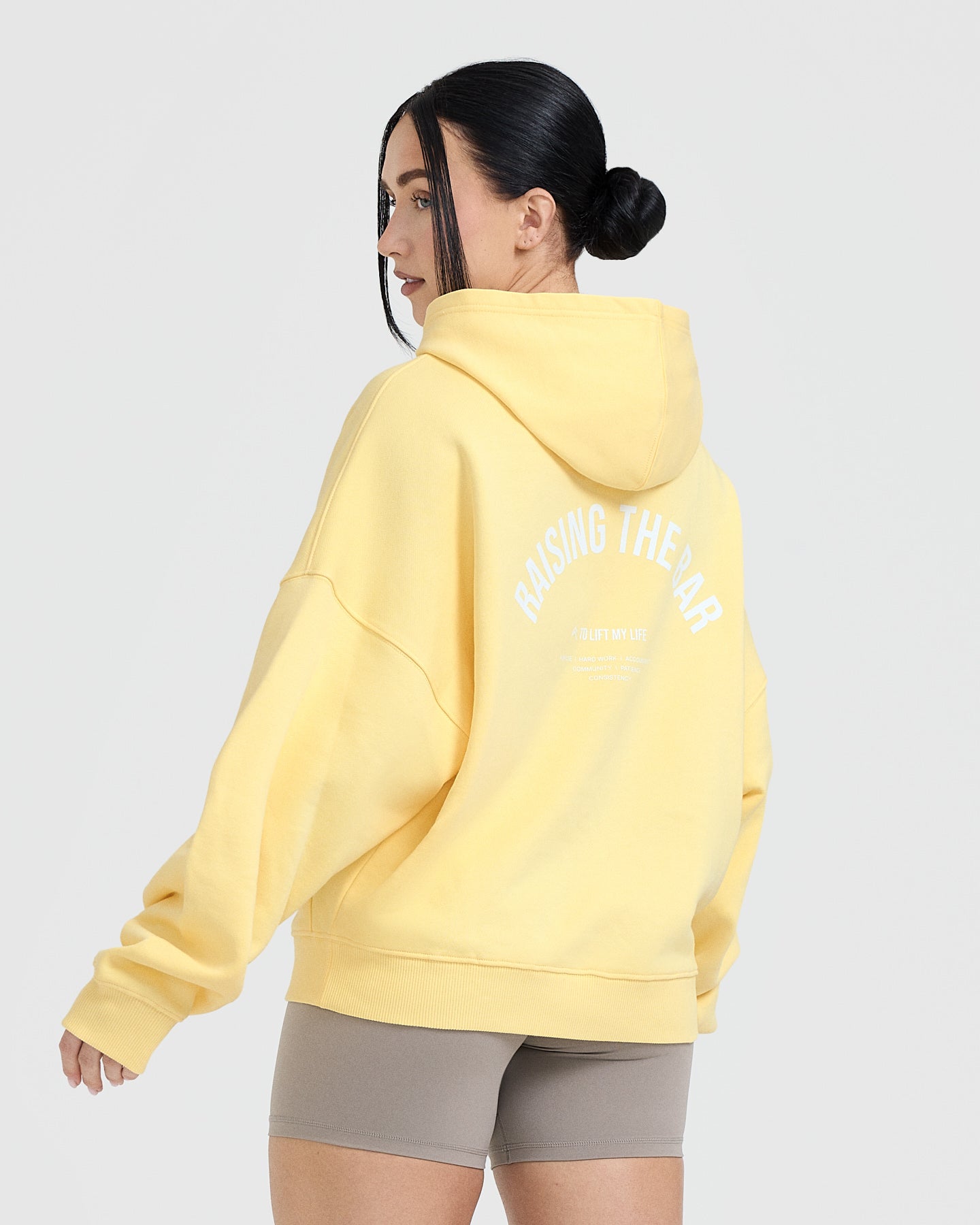 Alternative view of Raising the Bar Graphic Unisex Oversized Hoodie | Sherbert Yellow