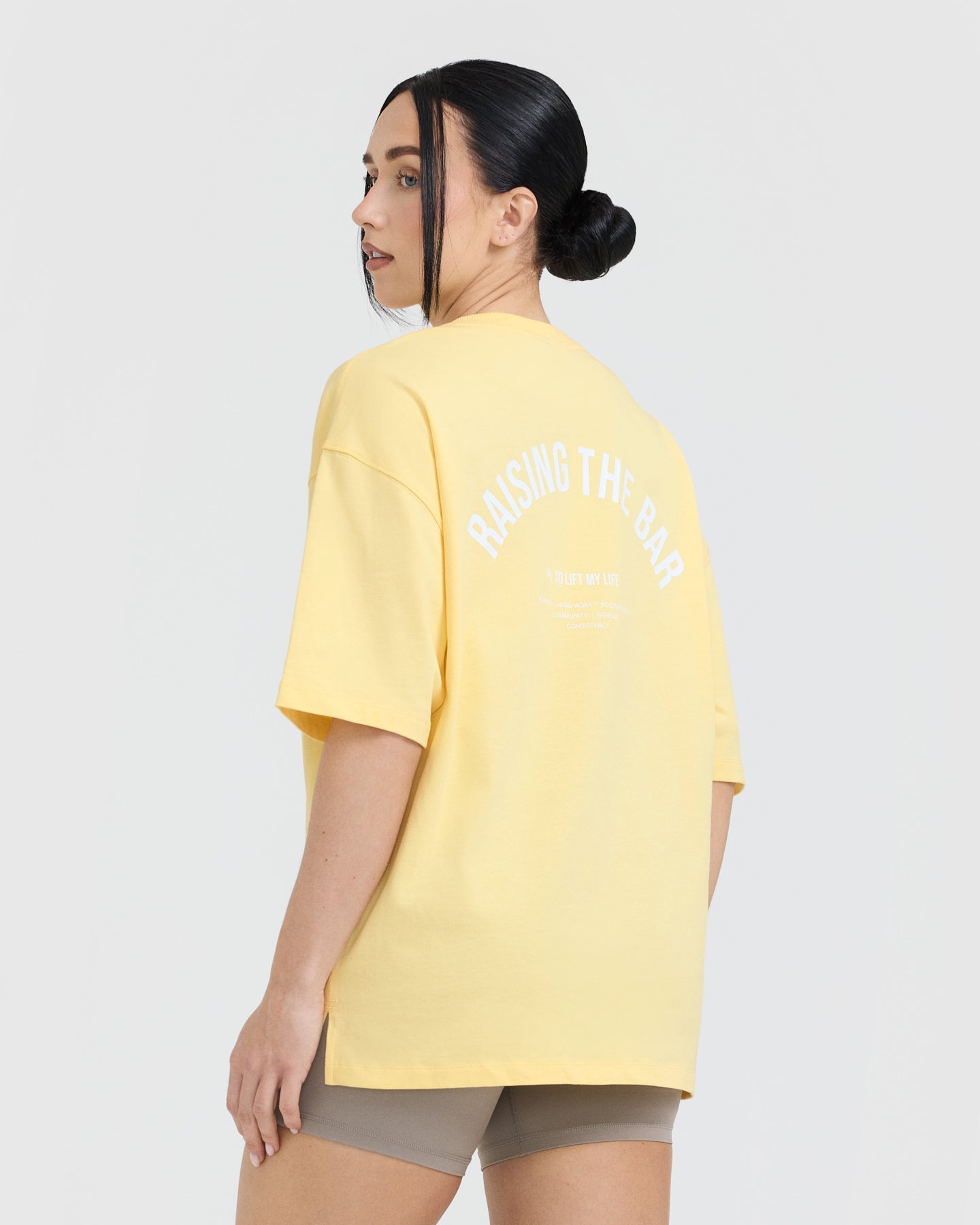 Alternative view of Raising The Bar Graphic Unisex T-Shirt | Sherbert Yellow