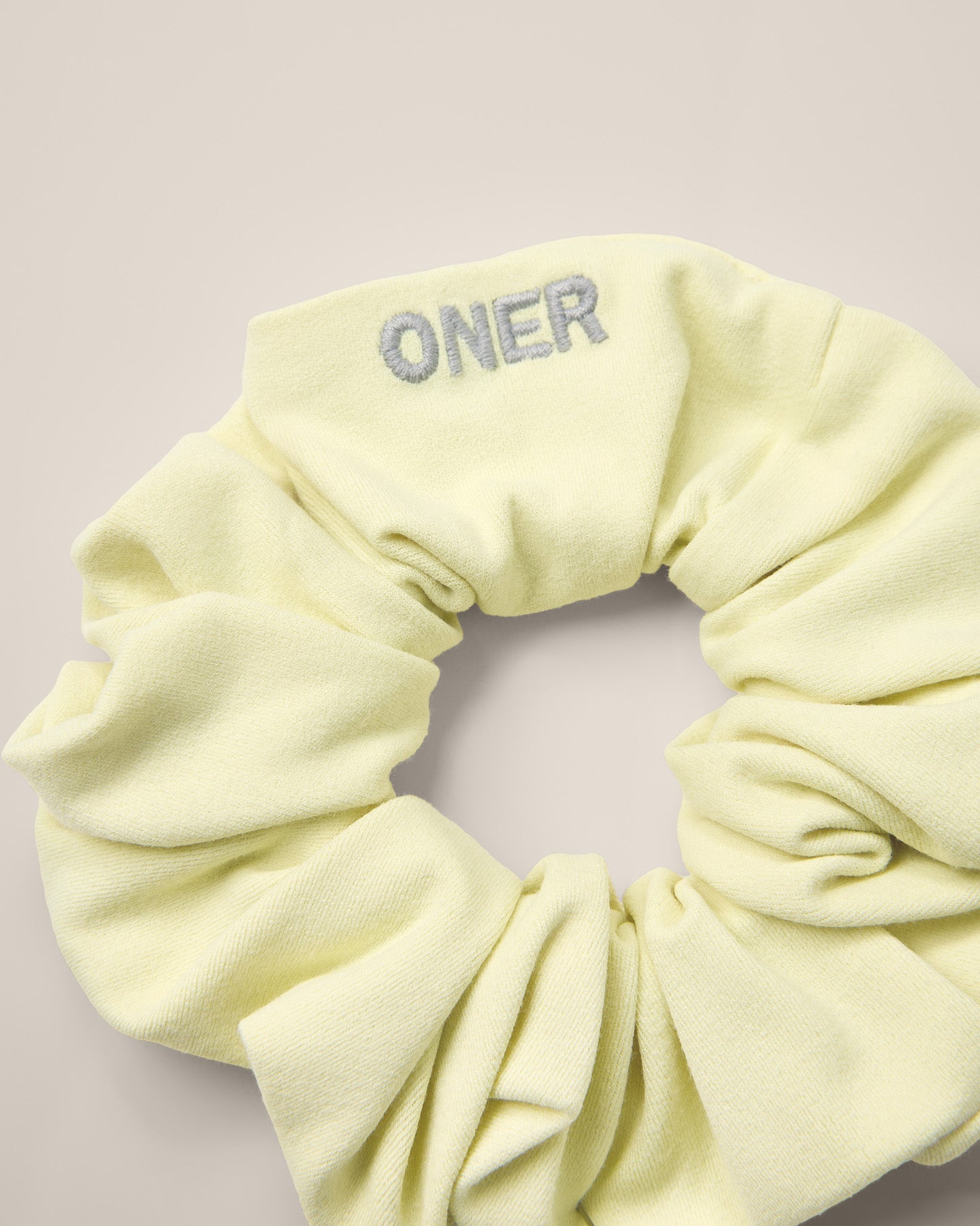 SoftMotion Scrunchie with Grey Logo | Pastel Yellow - Image 6