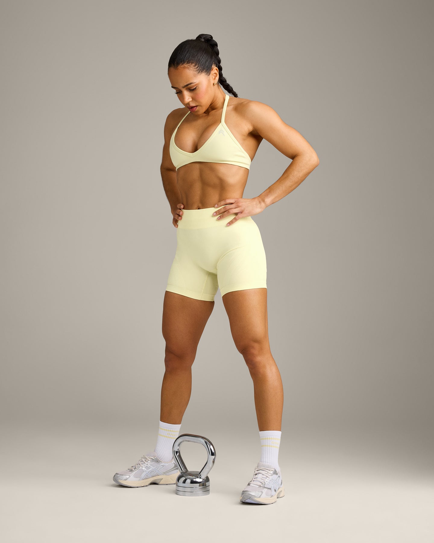 EnhanceLift Seamless Minimal Halter Neck Bralette with Grey Logo | Pastel Yellow - Image 6