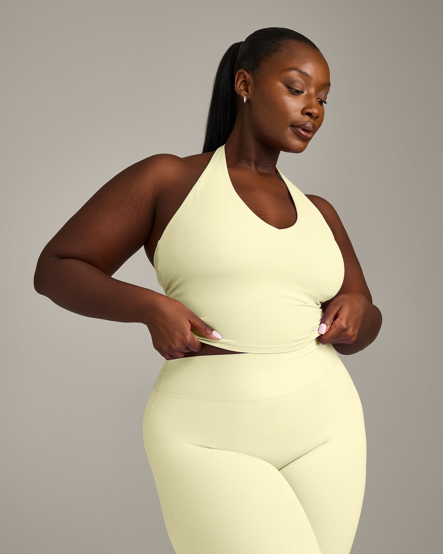 SoftMotion Halter Neck Mid Vest with Built in Bra Shelf with Grey Logo | Pastel Yellow