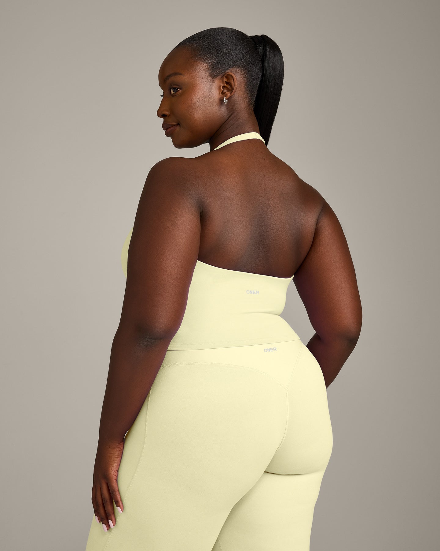 Alternative view of SoftMotion Halter Neck Mid Vest with Built in Bra Shelf with Grey Logo | Pastel Yellow