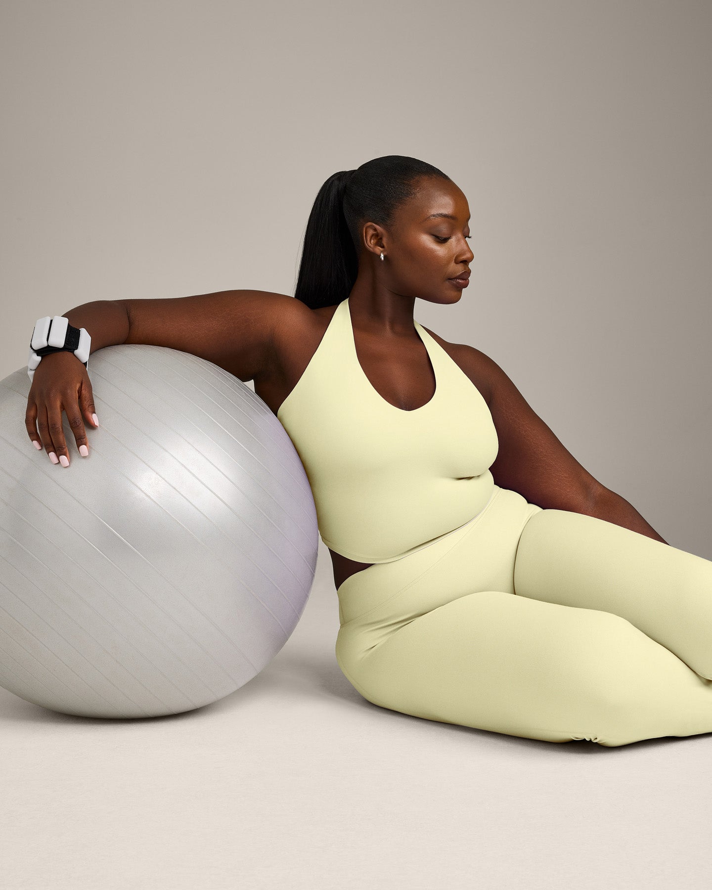 SoftMotion Halter Neck Mid Vest with Built in Bra Shelf with Grey Logo | Pastel Yellow - Image 3