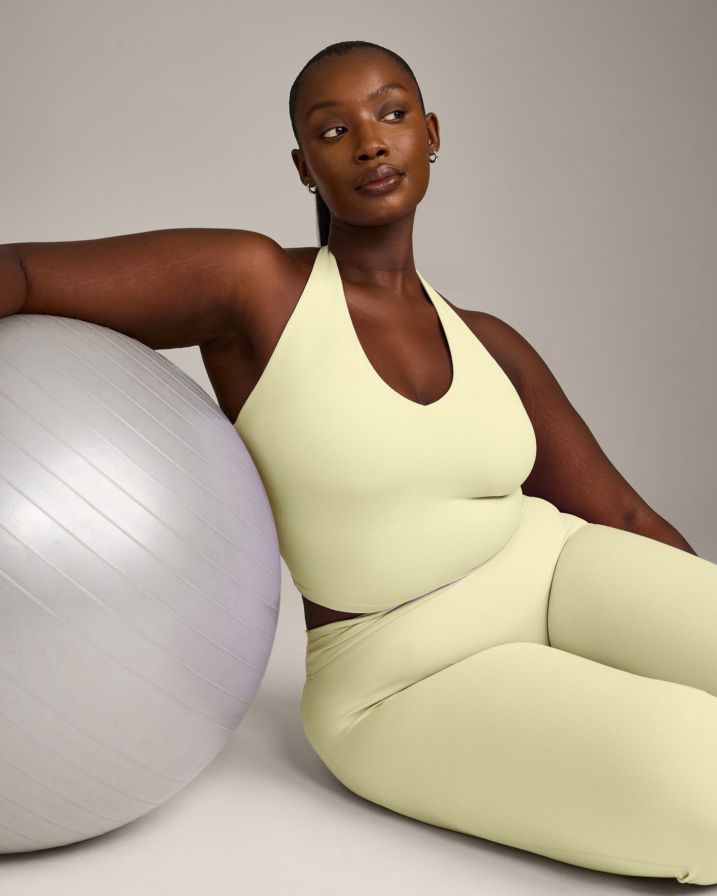 SoftMotion Halter Neck Mid Vest with Built in Bra Shelf with Grey Logo | Pastel Yellow - Image 5