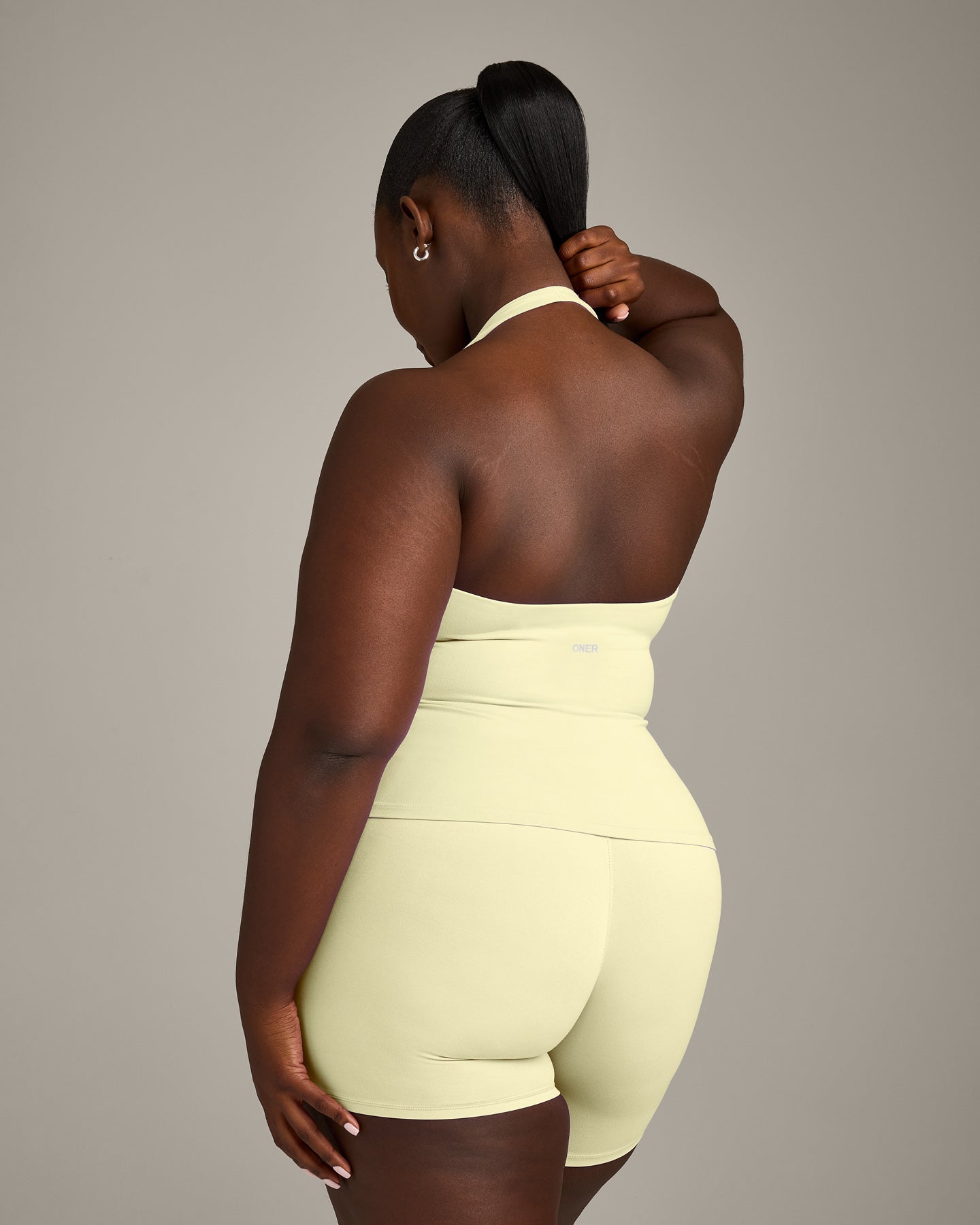 SoftMotion Halter Neck Vest with Built in Bra Shelf with Grey Logo | Pastel Yellow - Image 4