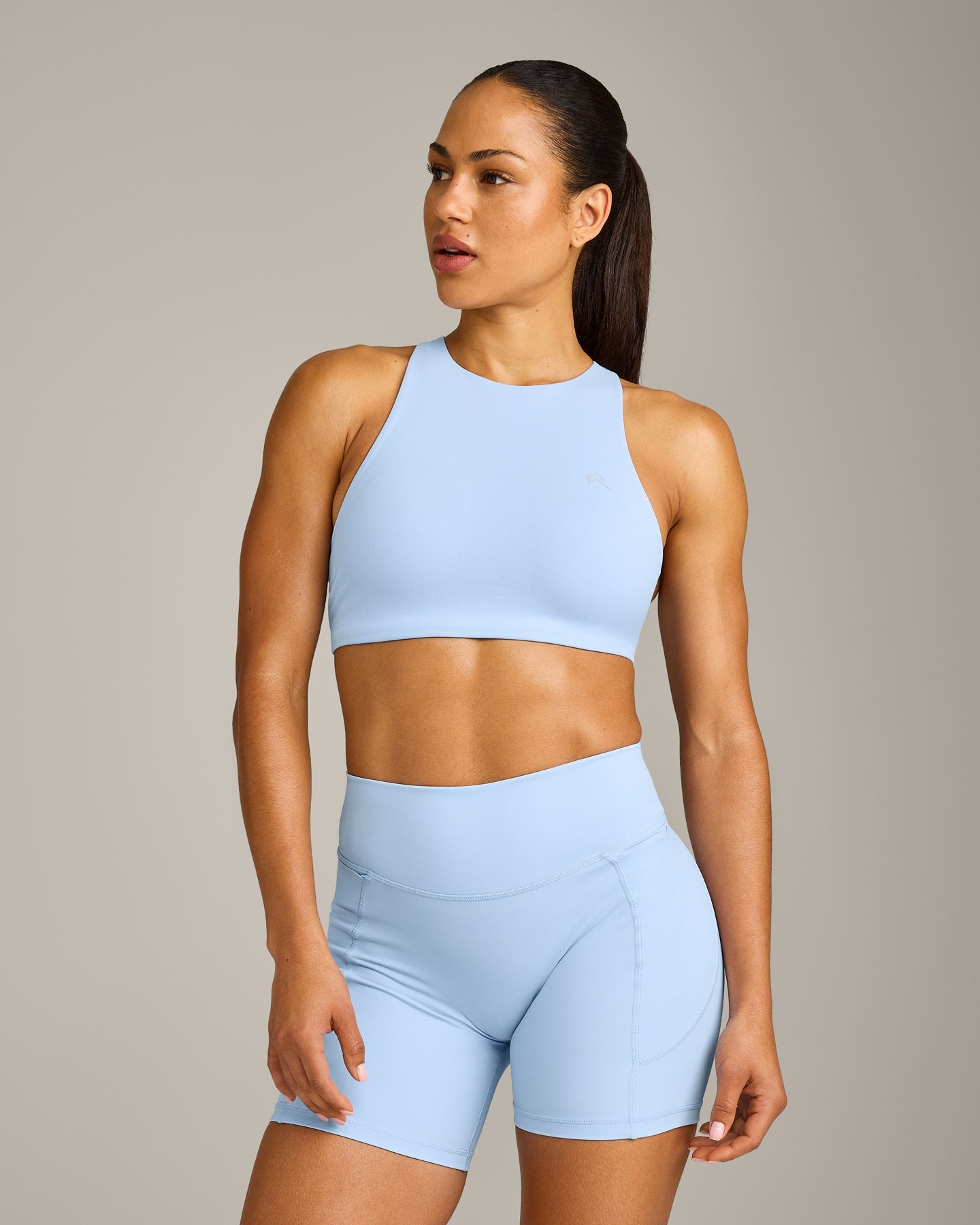 EasyLift High Neck Sports Bra with Grey Logo | Powdered Blue