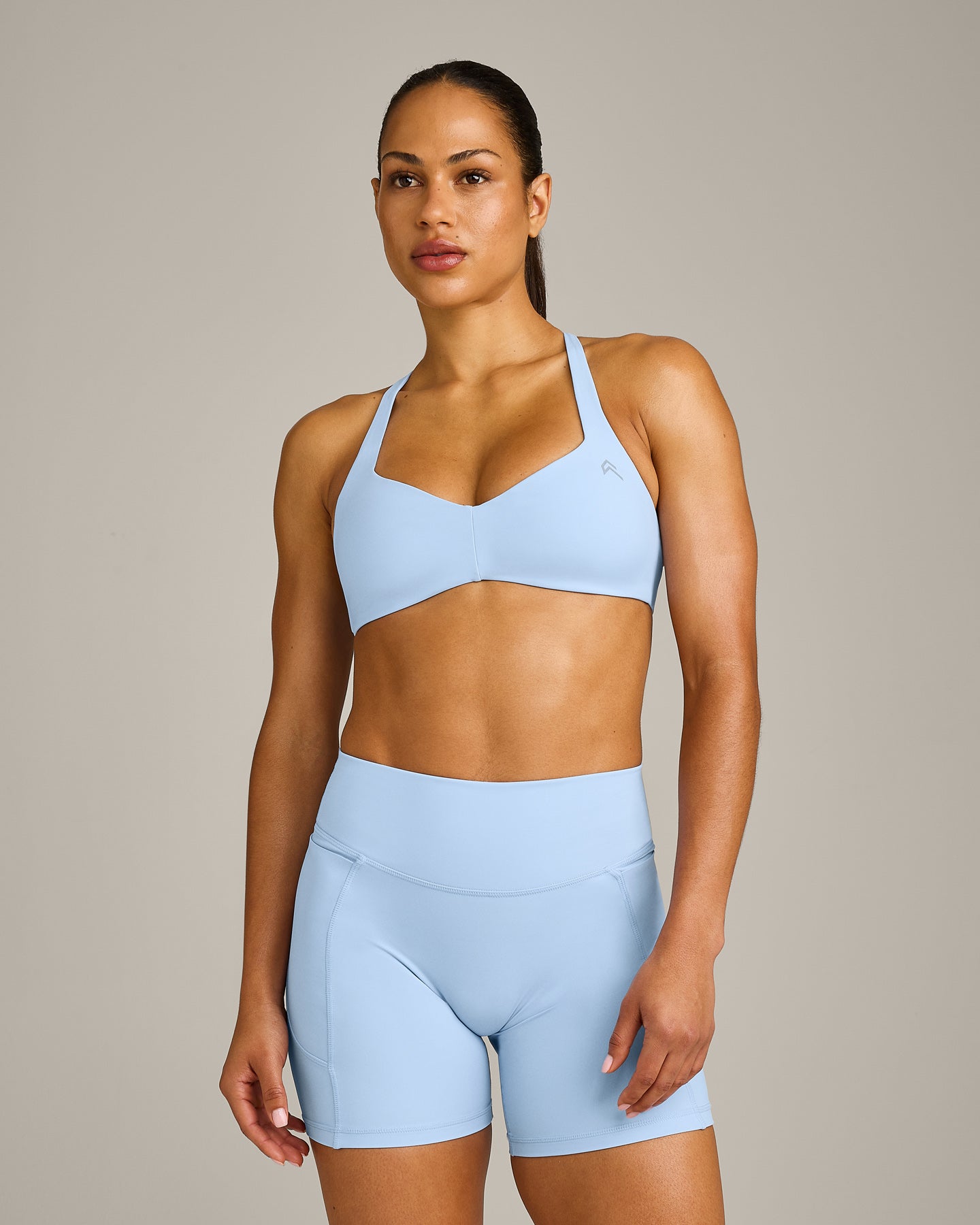 UnifiedMove T Back Minimal Bralette with Reflective Logo | Powdered Blue