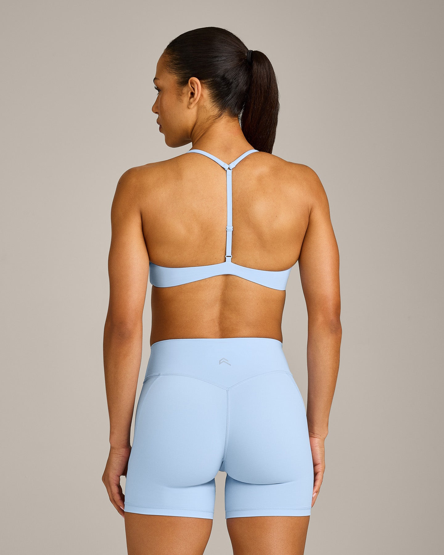 Alternative view of UnifiedMove T Back Minimal Bralette with Reflective Logo | Powdered Blue