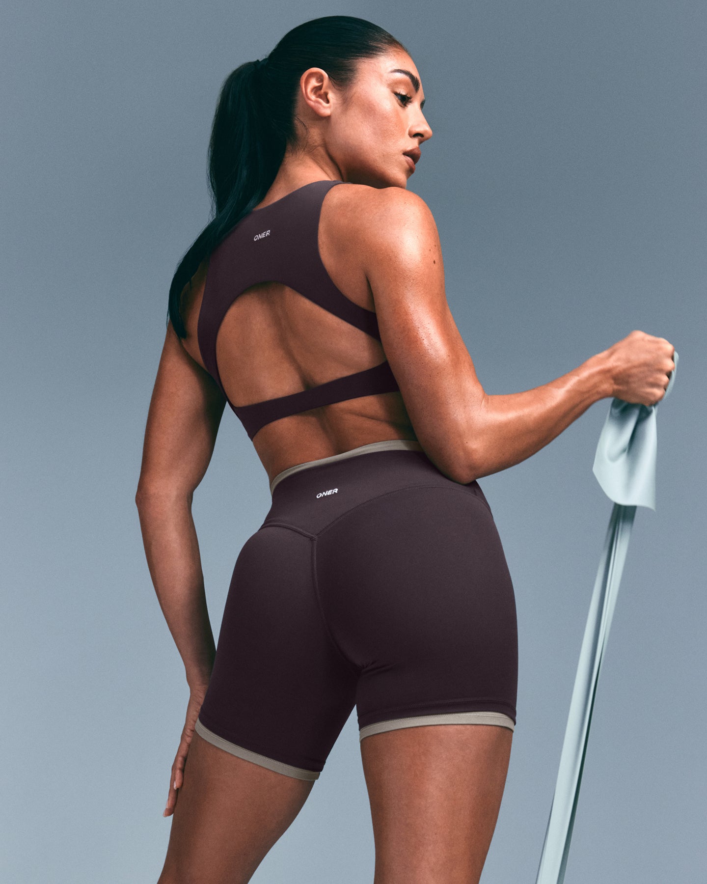 Alternative view of SoftMotion High Neck Sports Bra with Grey Logo | Dark Umber Brown