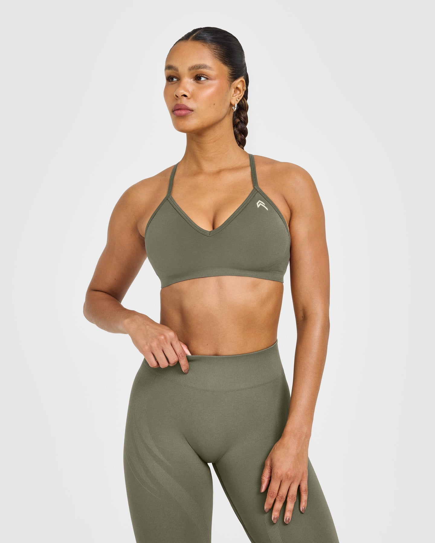 EnhanceLift Seamless Strappy Sports Bra with White Logo | Alpine Green