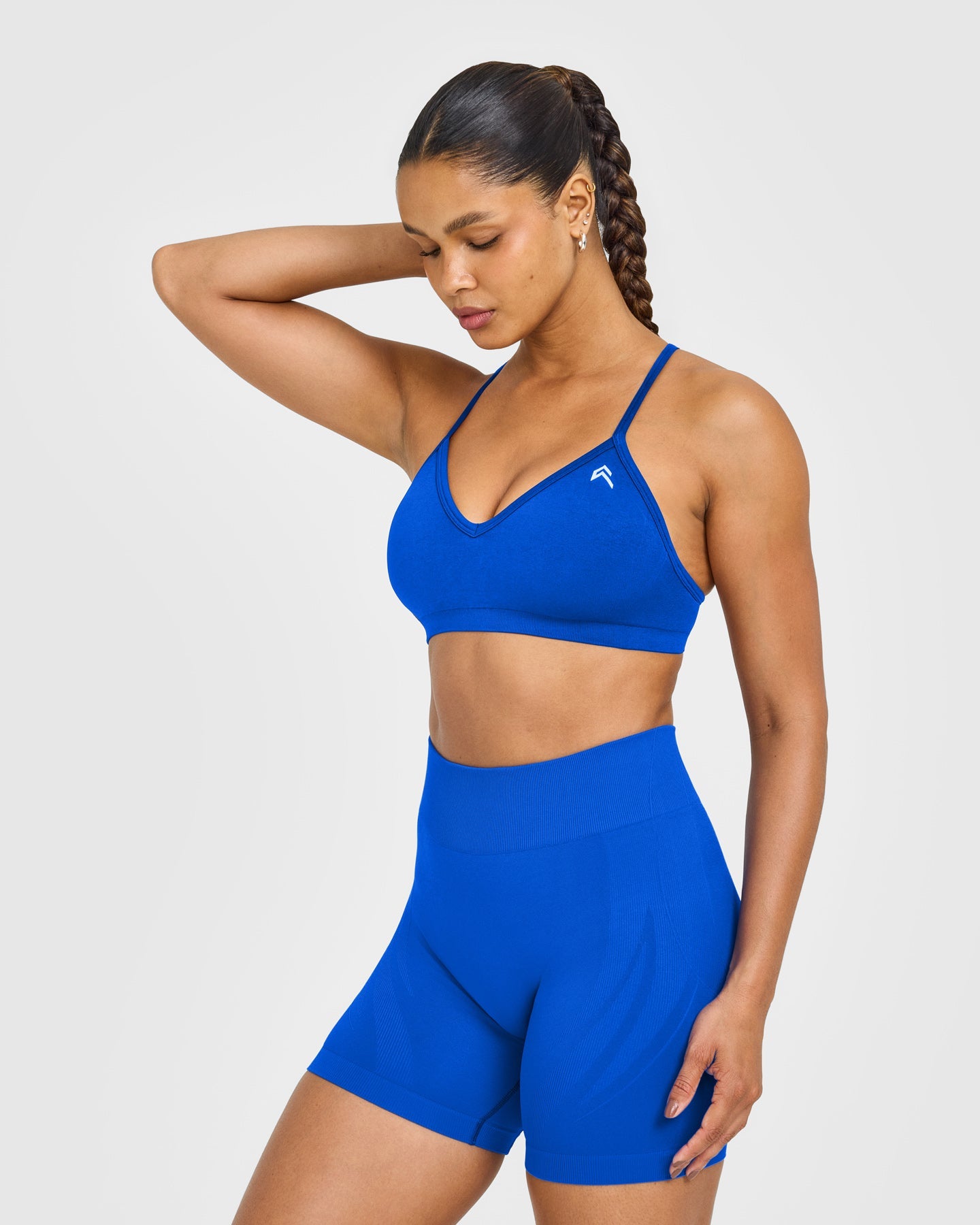 EnhanceLift Seamless Strappy Sports Bra with White Logo | Cobalt Blue