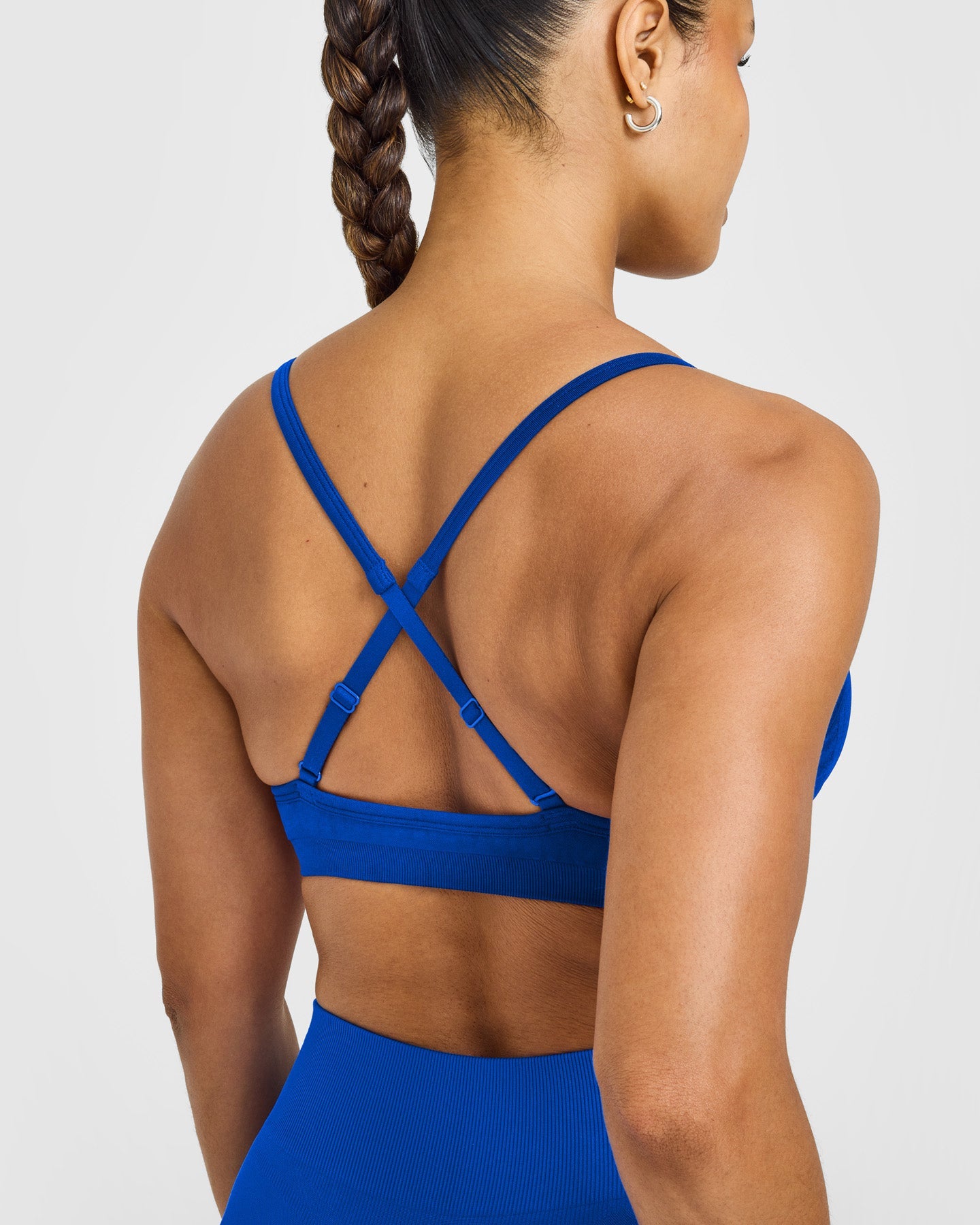 EnhanceLift Seamless Strappy Sports Bra with White Logo | Cobalt Blue - Image 4