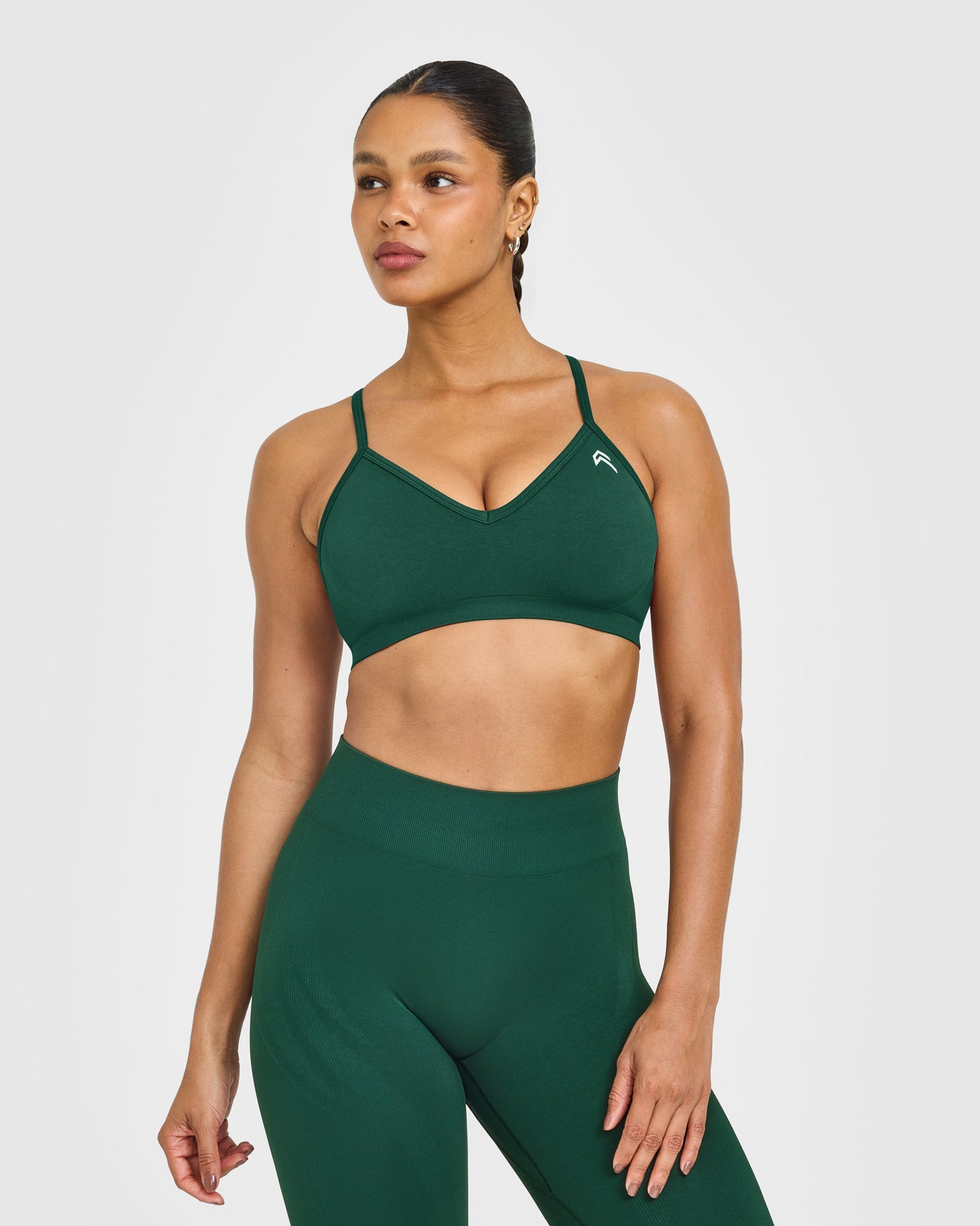 EnhanceLift Seamless Strappy Sports Bra with White Logo | Racing Green