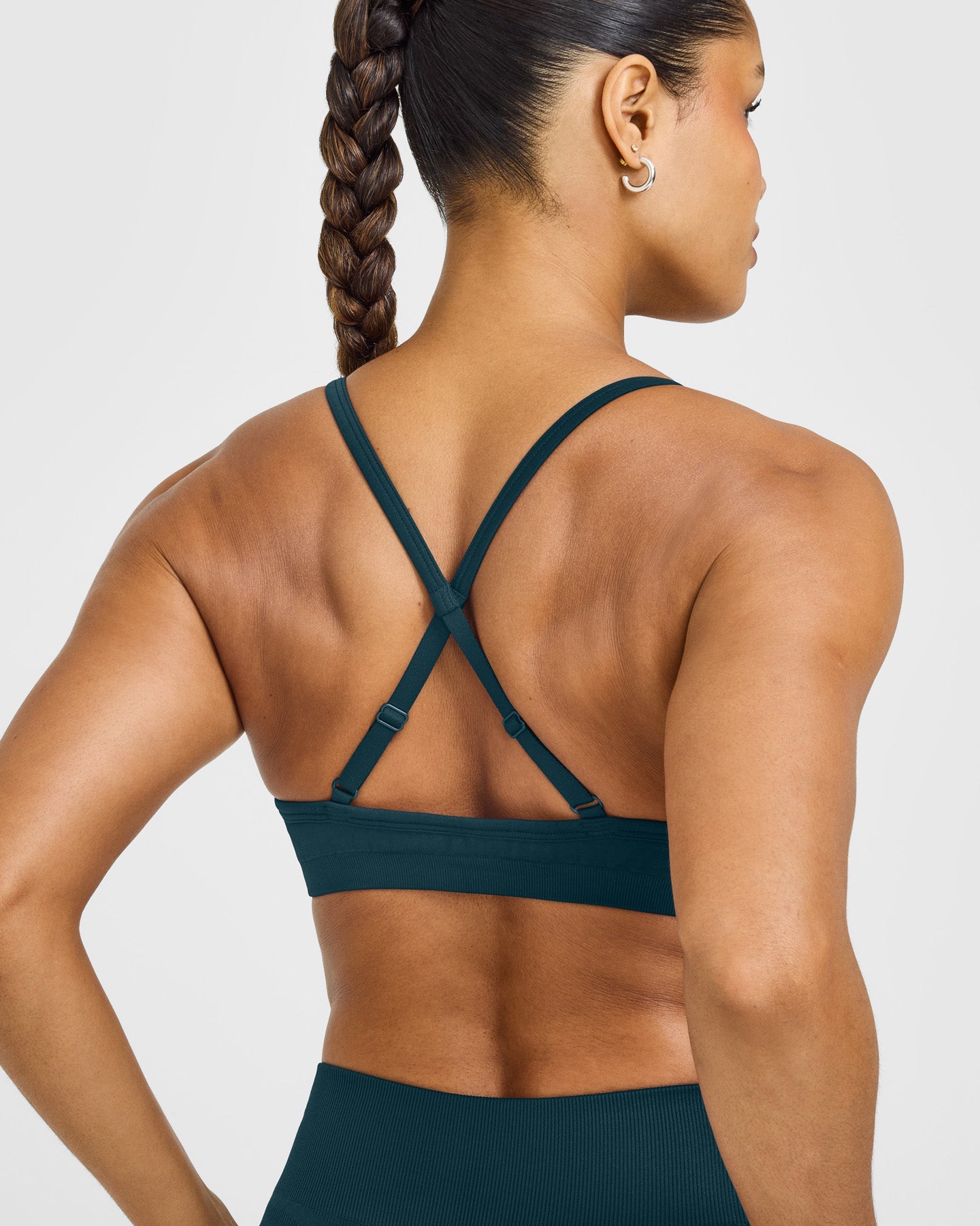 EnhanceLift Seamless Strappy Sports Bra with White Logo | Washed Oil Blue - Image 6