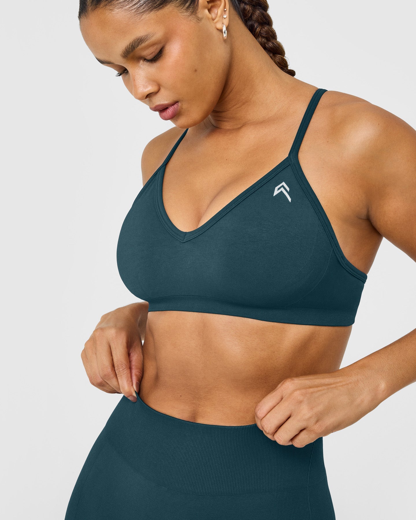 EnhanceLift Seamless Strappy Sports Bra with White Logo | Washed Oil Blue - Image 4