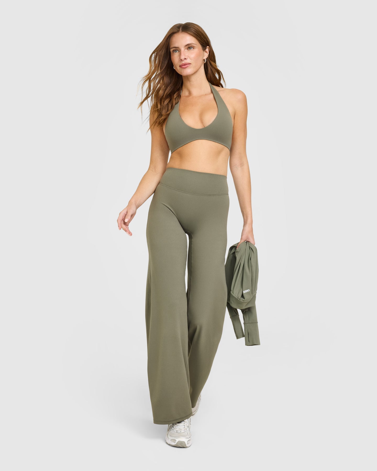 SoftMotion Minimal Halter Neck Bralette with White Logo | Alpine Green - Image 3