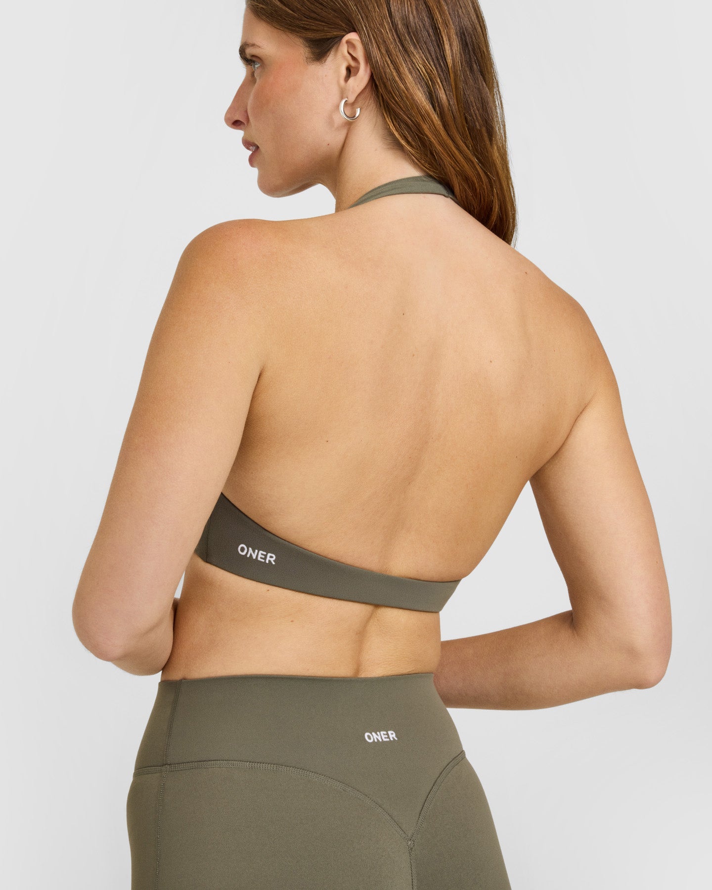 SoftMotion Minimal Halter Neck Bralette with White Logo | Alpine Green - Image 4