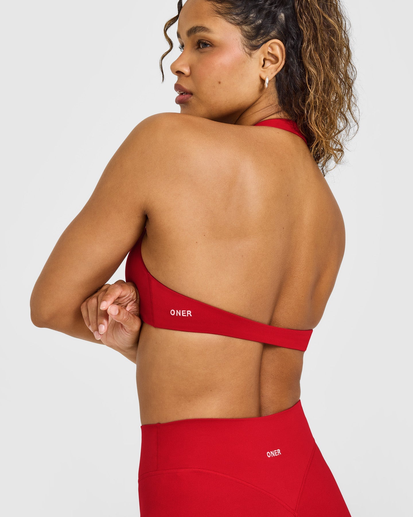 SoftMotion Minimal Halter Neck Bralette with White Logo | Light Toasted Red - Image 5